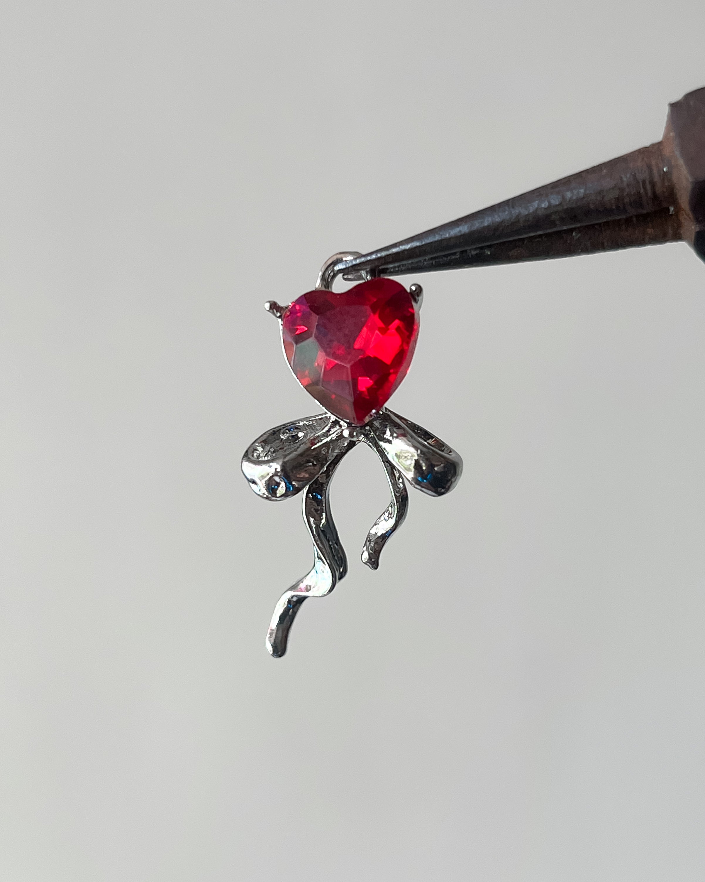 Red heart ribbon charm