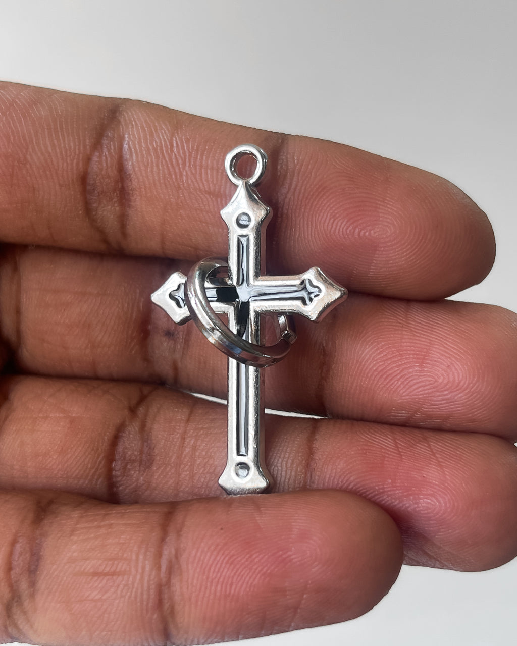 Black ring cross pendant