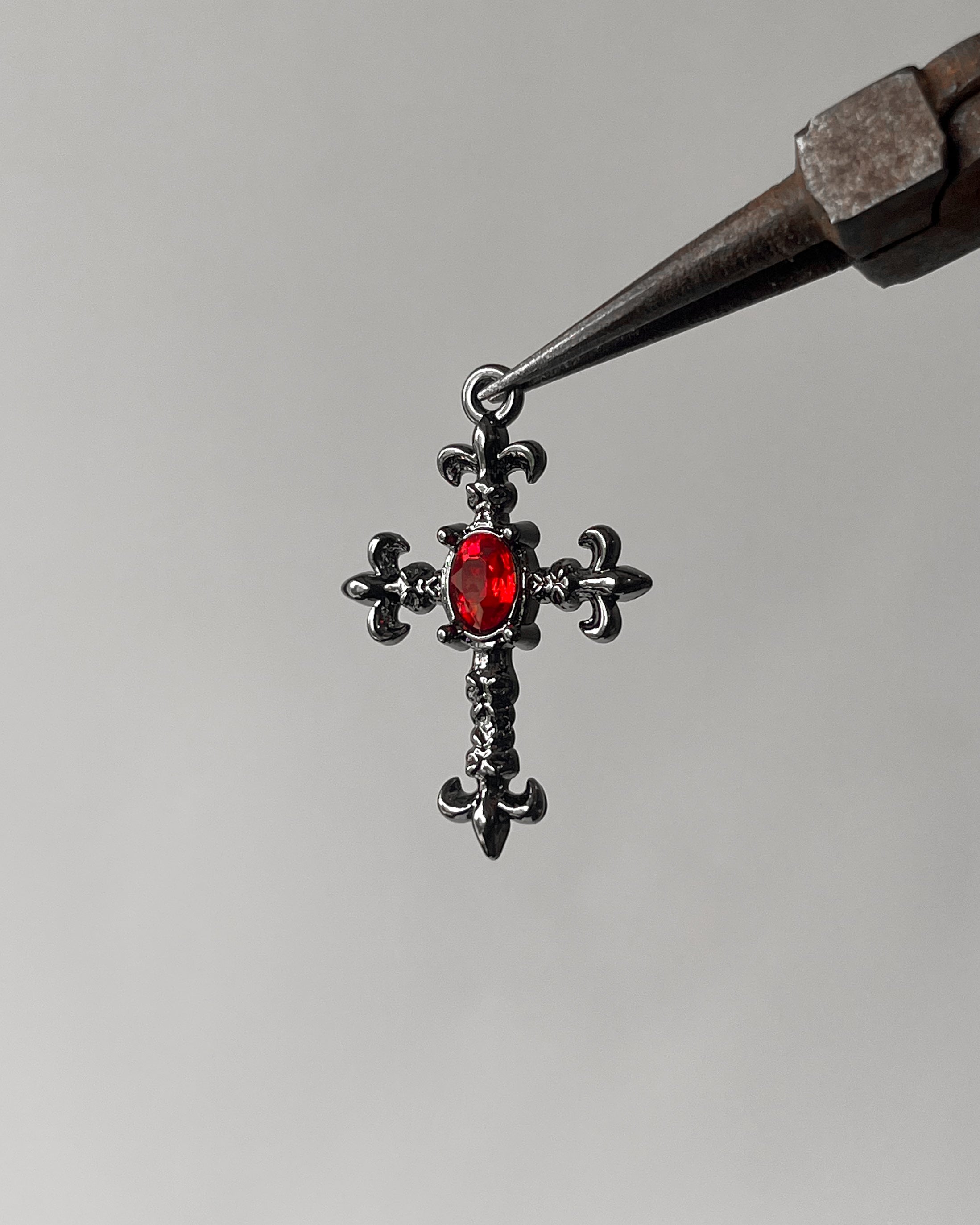 Red clover cross charm