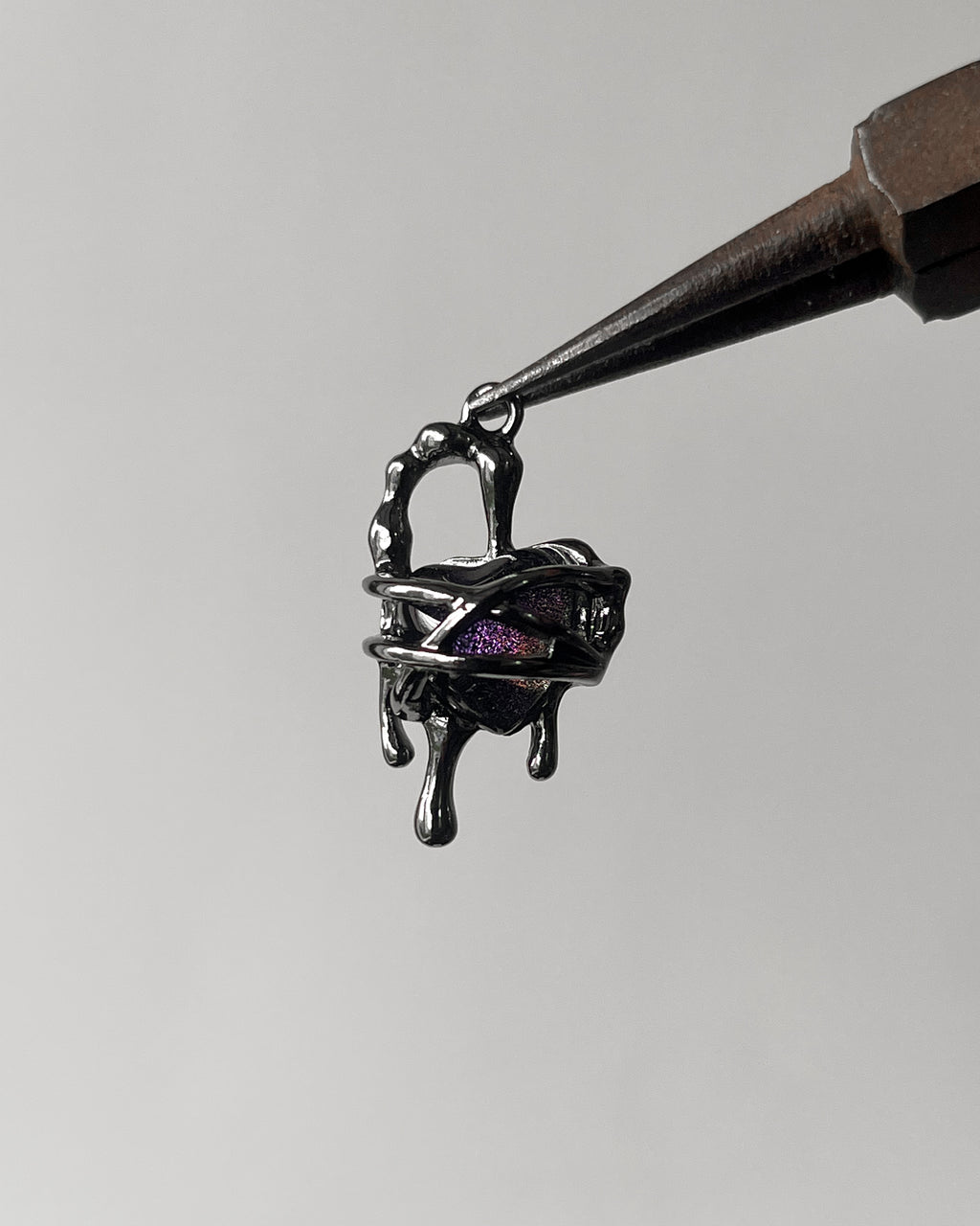 Gothic melting heart charm