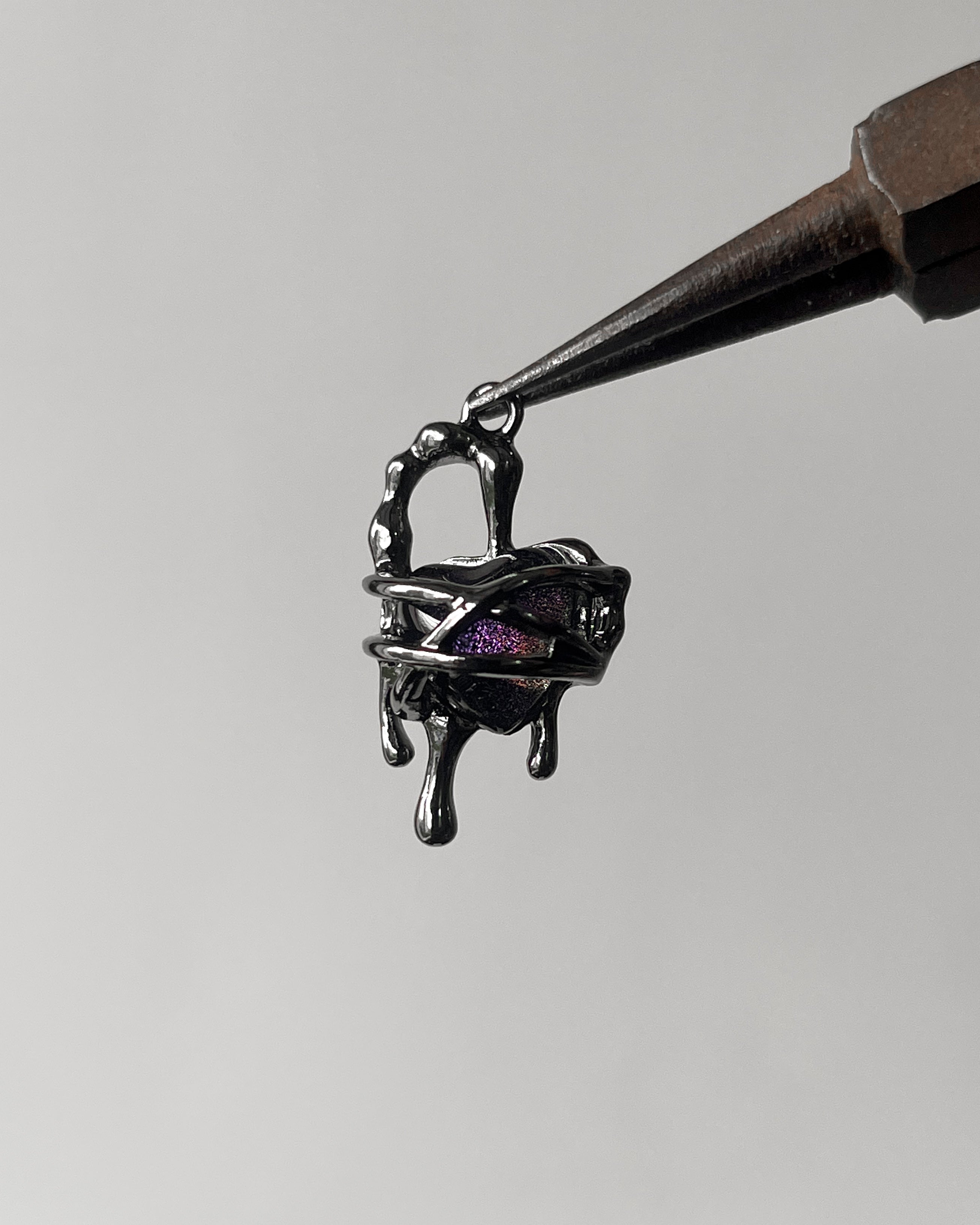 Gothic melting heart charm