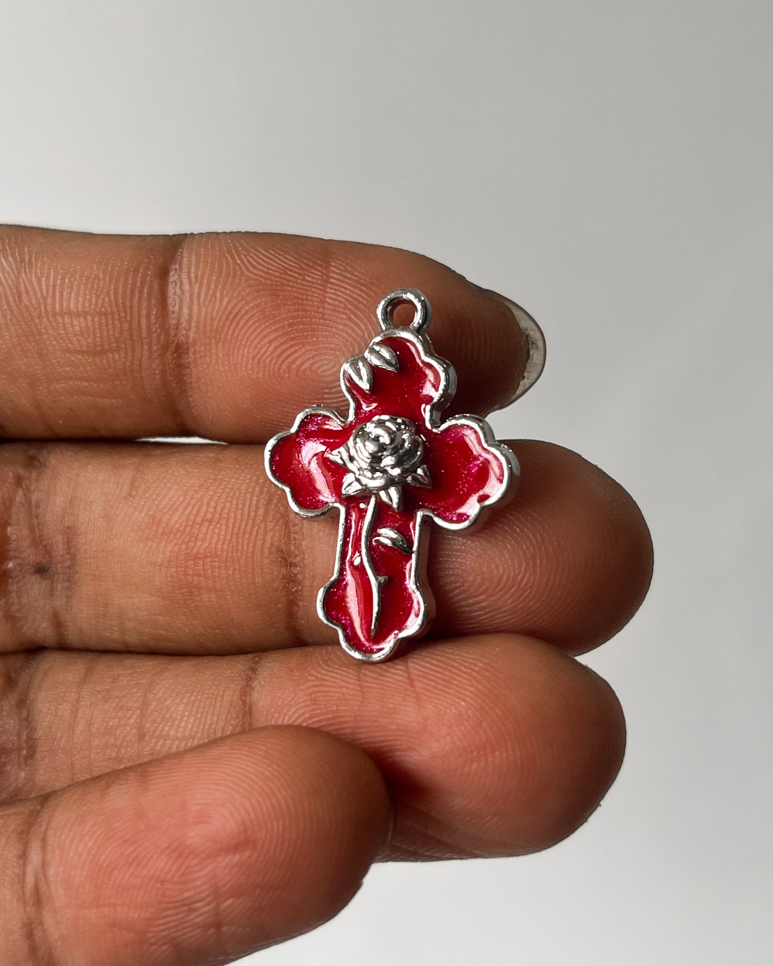 Red rose cross charm