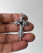 Black snake cross pendant
