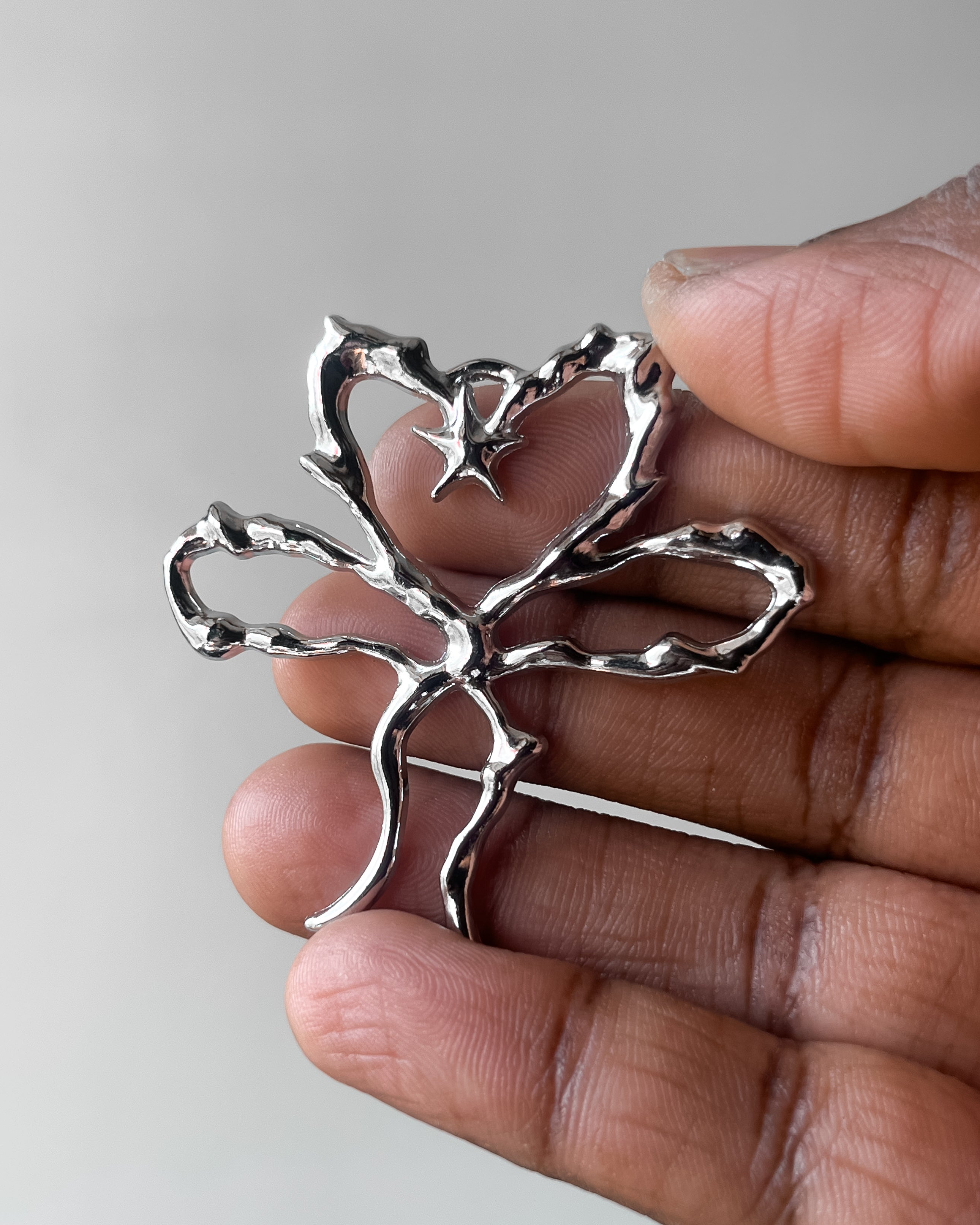 Ribbon heart pendant