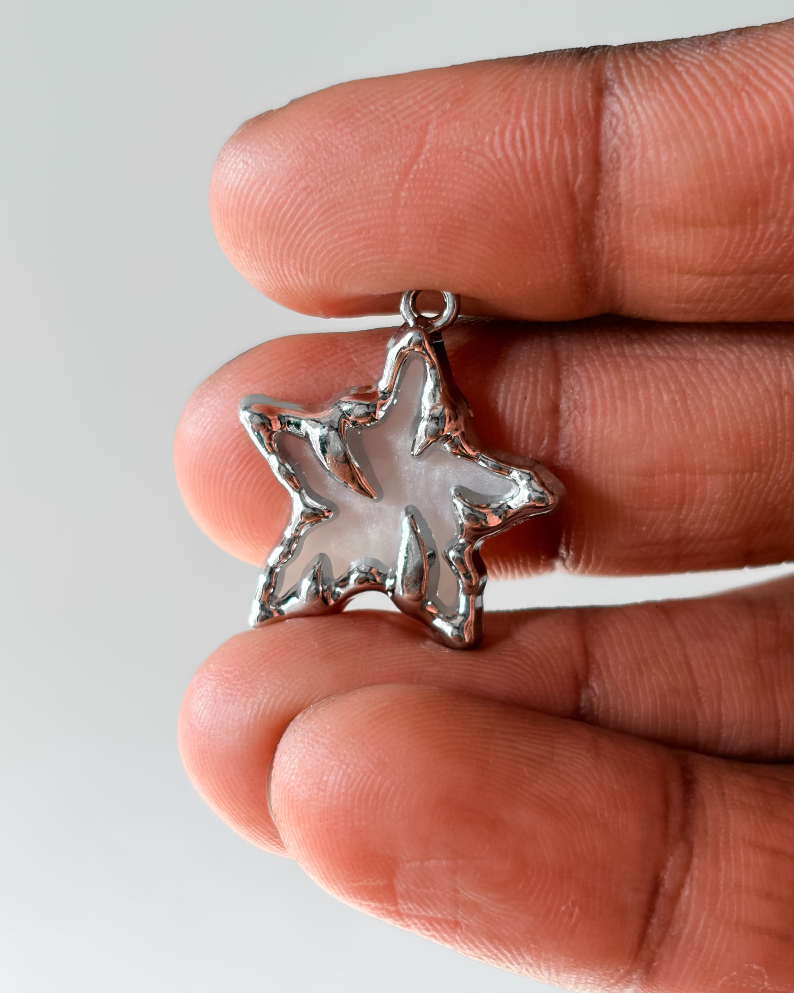 White Spike star charm - 3 pc