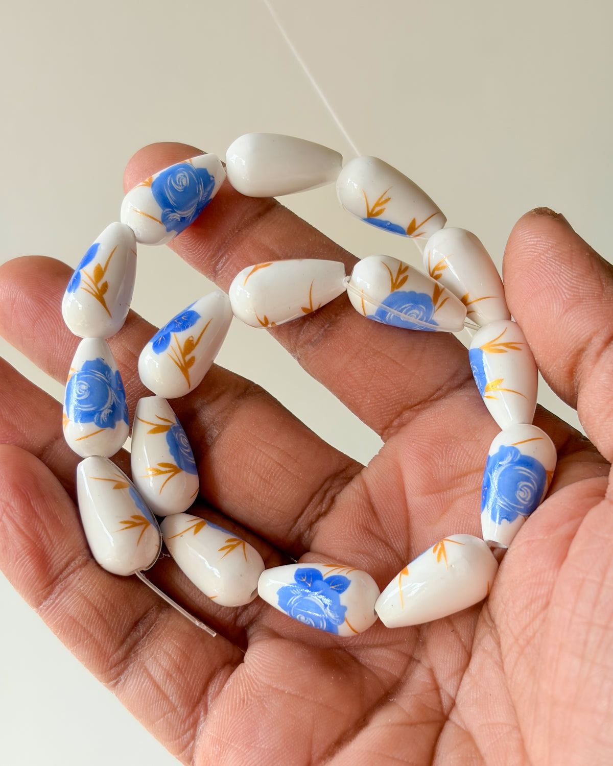 5.0 drop shape ceramic flower beads - 1 line
