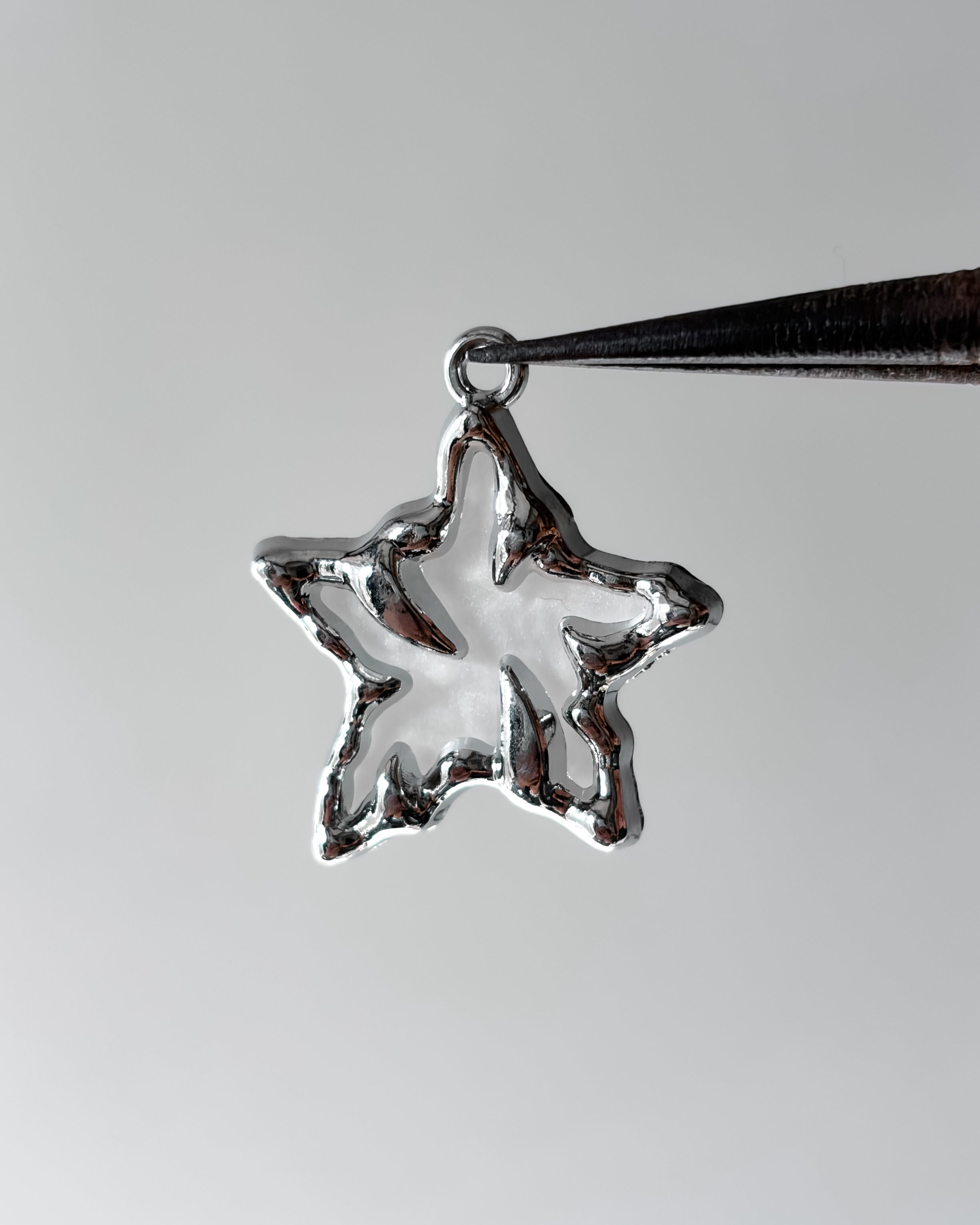 White Spike star charm - 3 pc