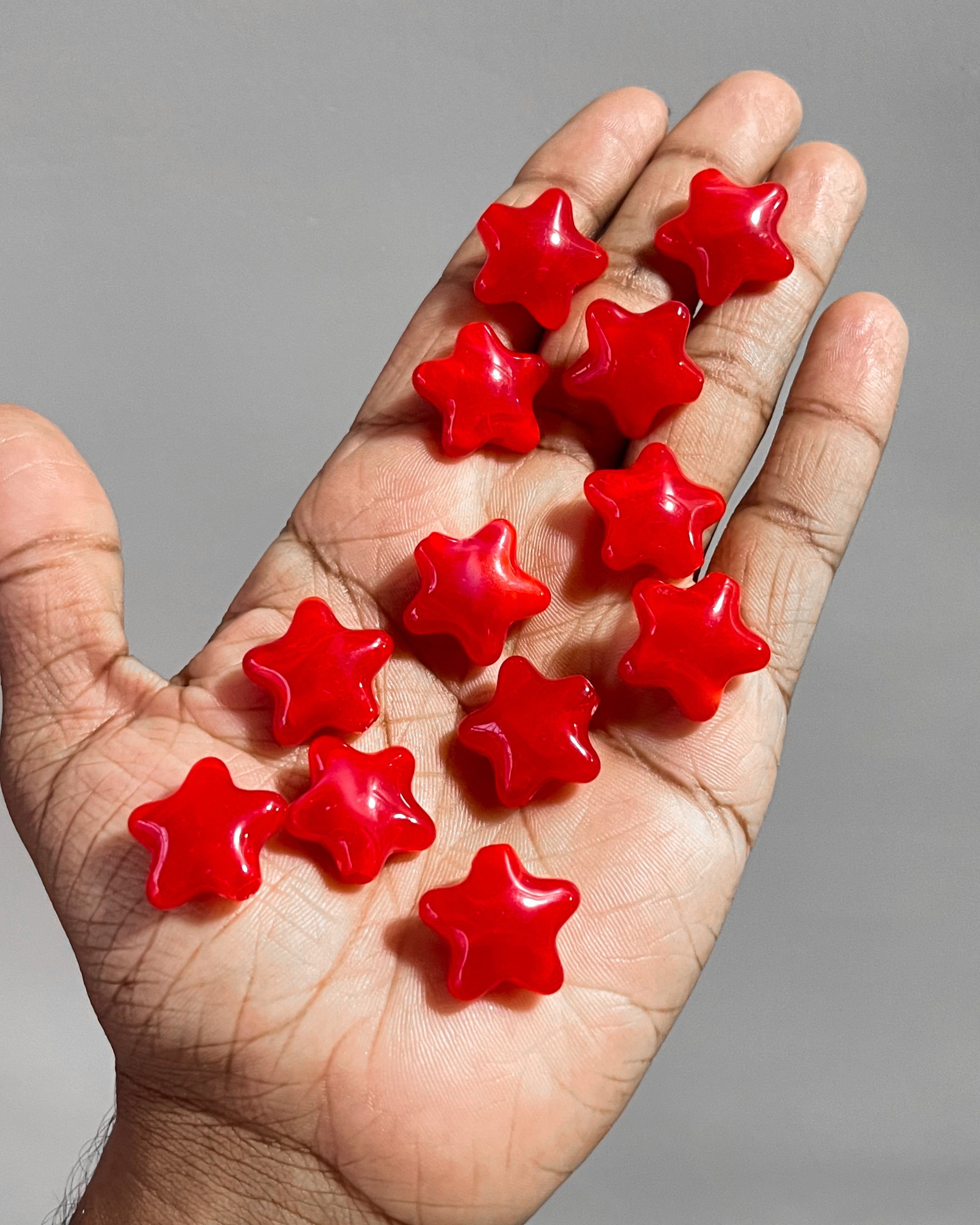 Jelly red star beads - 25 grams