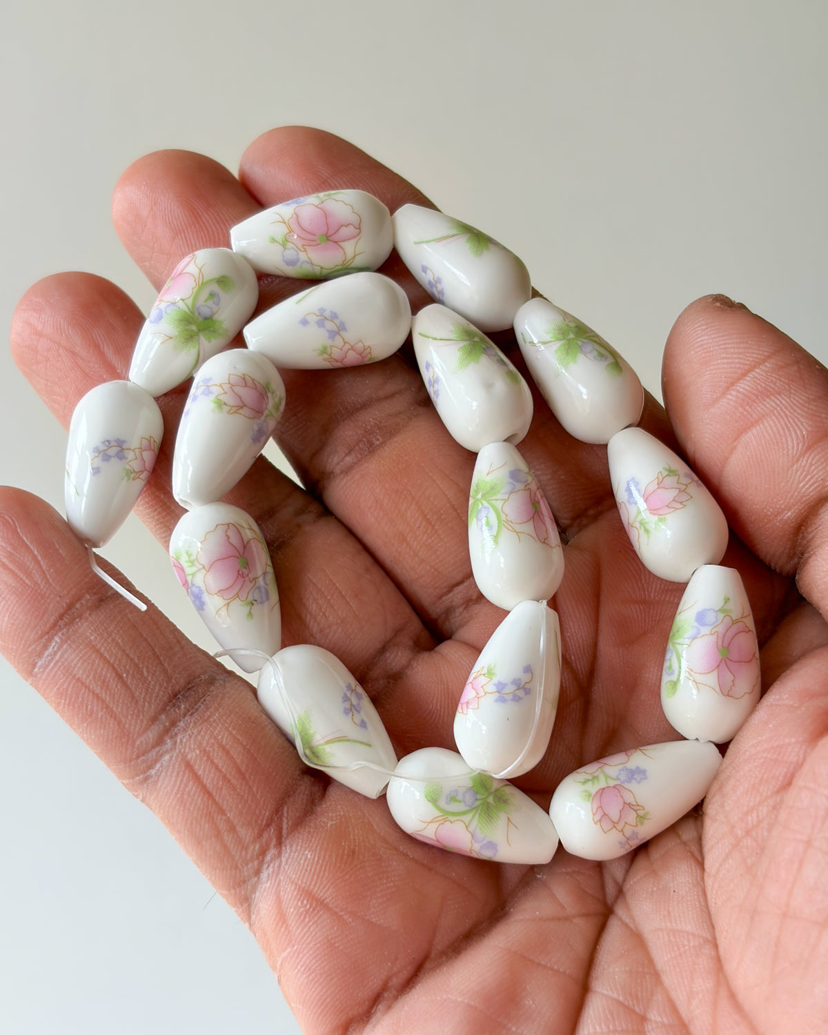 8.0 drop shape ceramic flower beads - 1 line