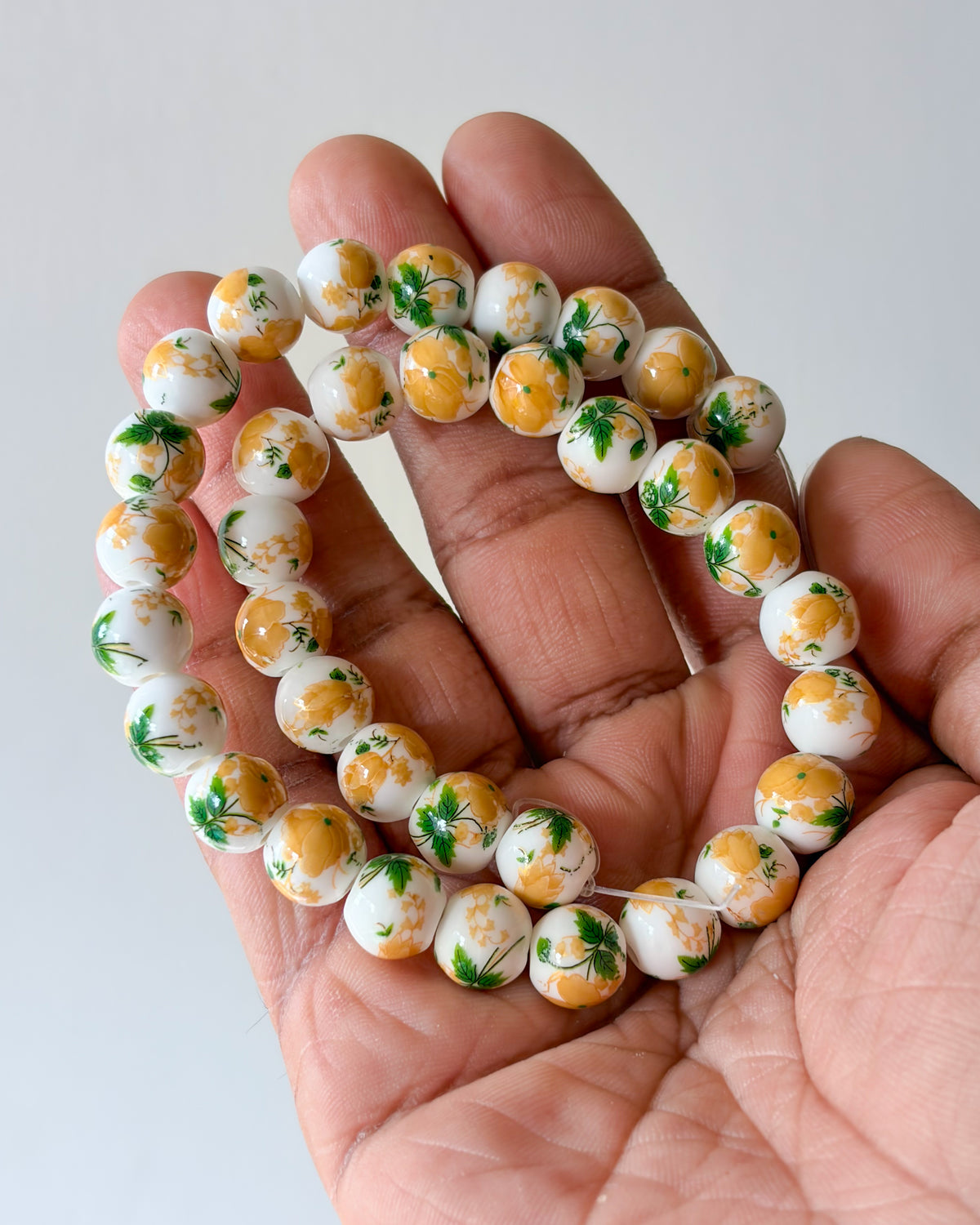 3.0 round ceramic flower beads - 1 line