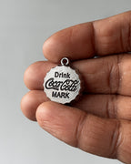 Cola charm