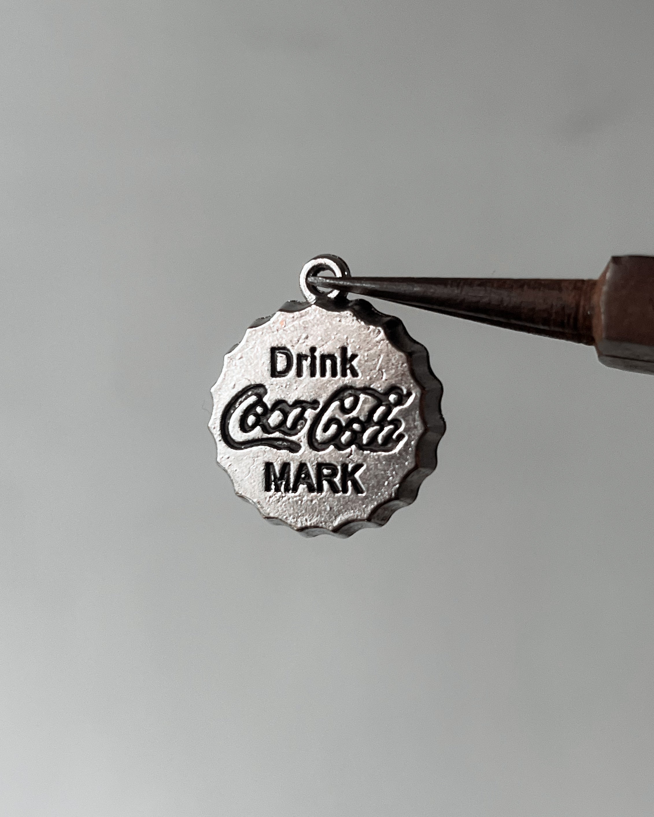 Cola charm