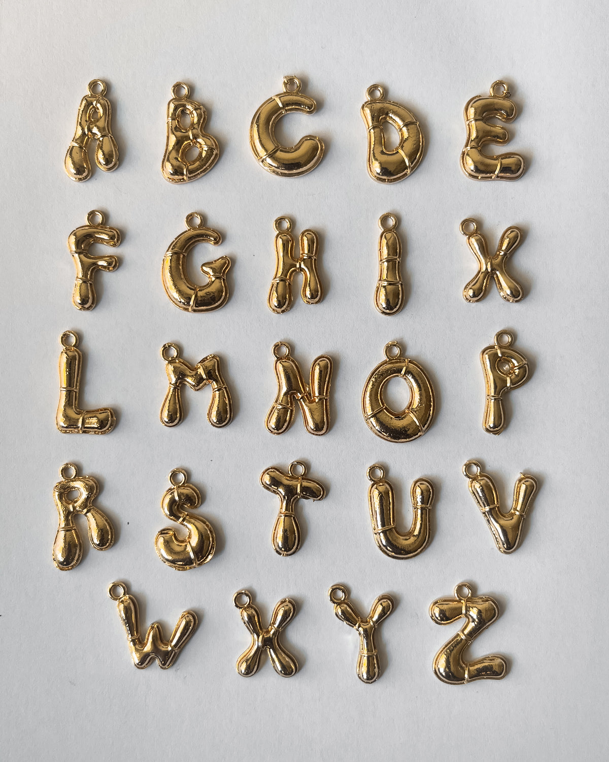 Alphabet mix charms- 100 grams
