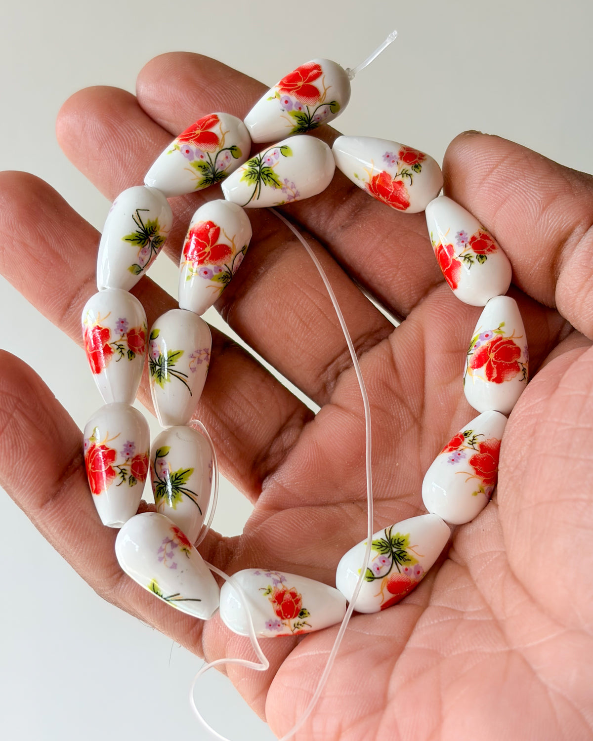 4.0 drop shape ceramic flower beads - 1 line