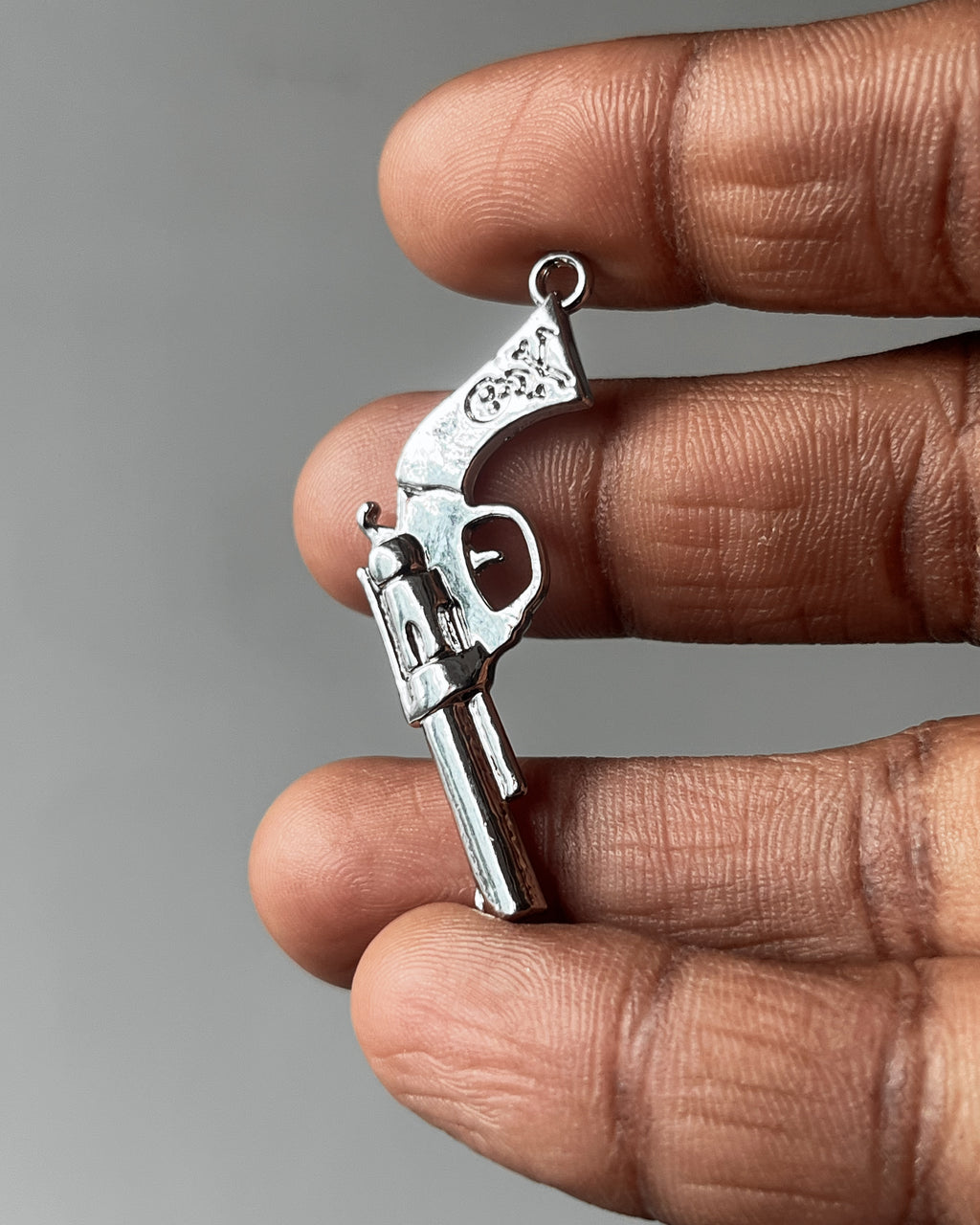 Big pistol charm