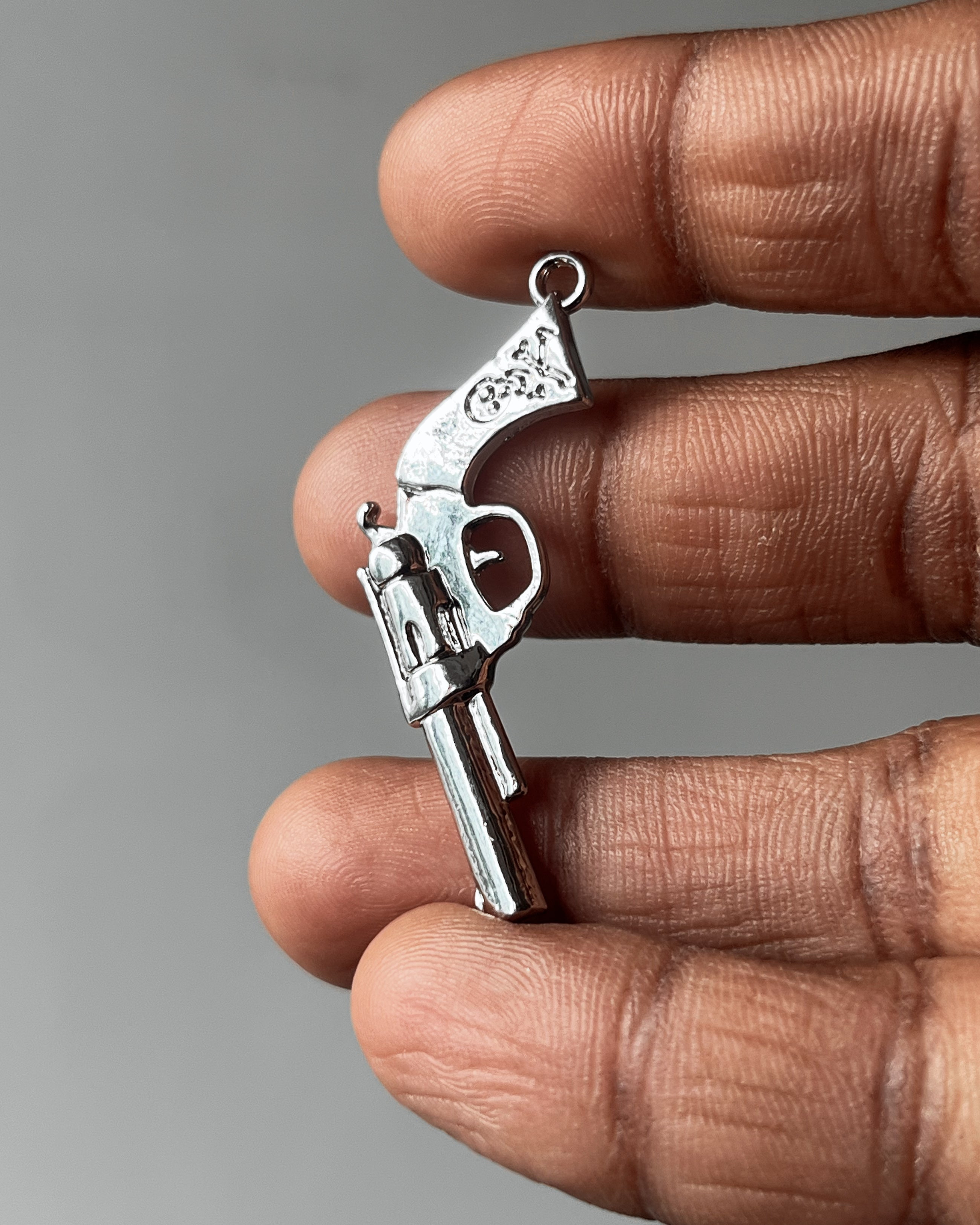 Big pistol charm