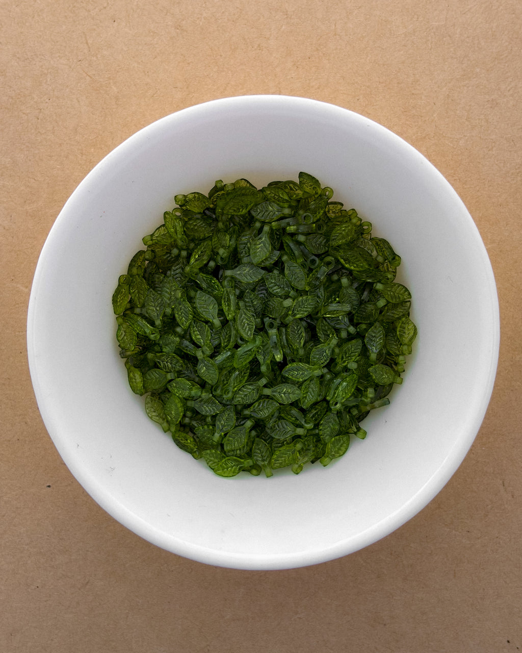Light green leaf beads - 25 grams