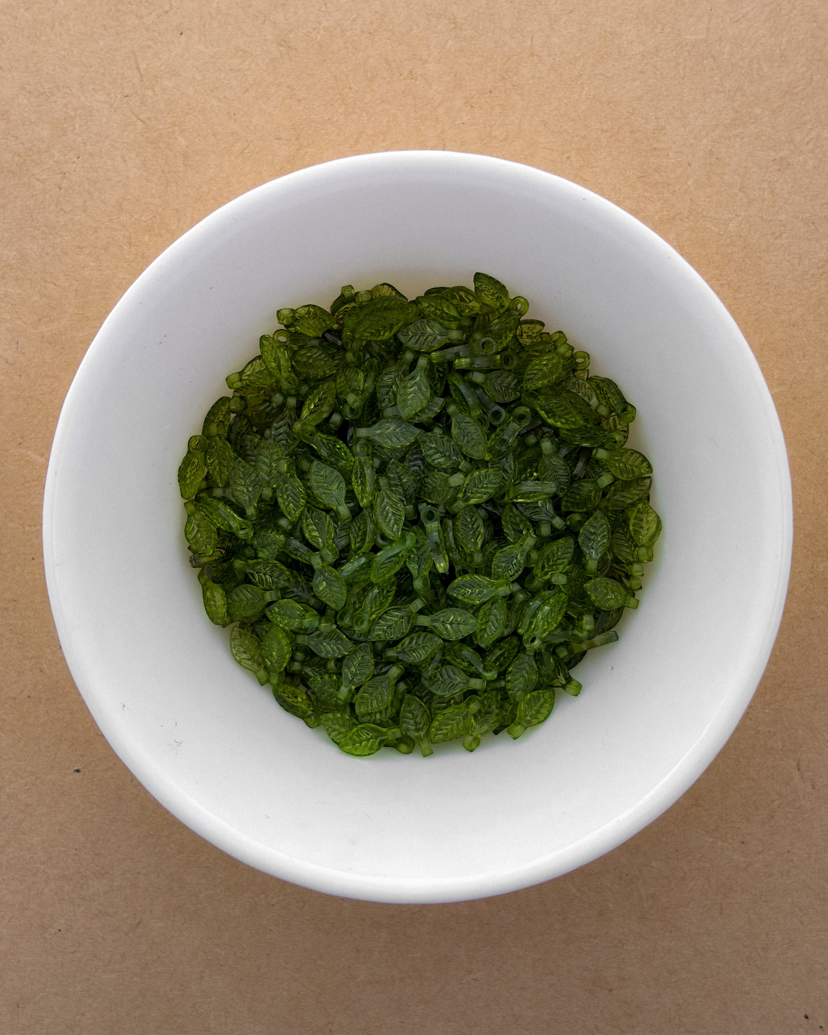 Light green leaf beads - 25 grams