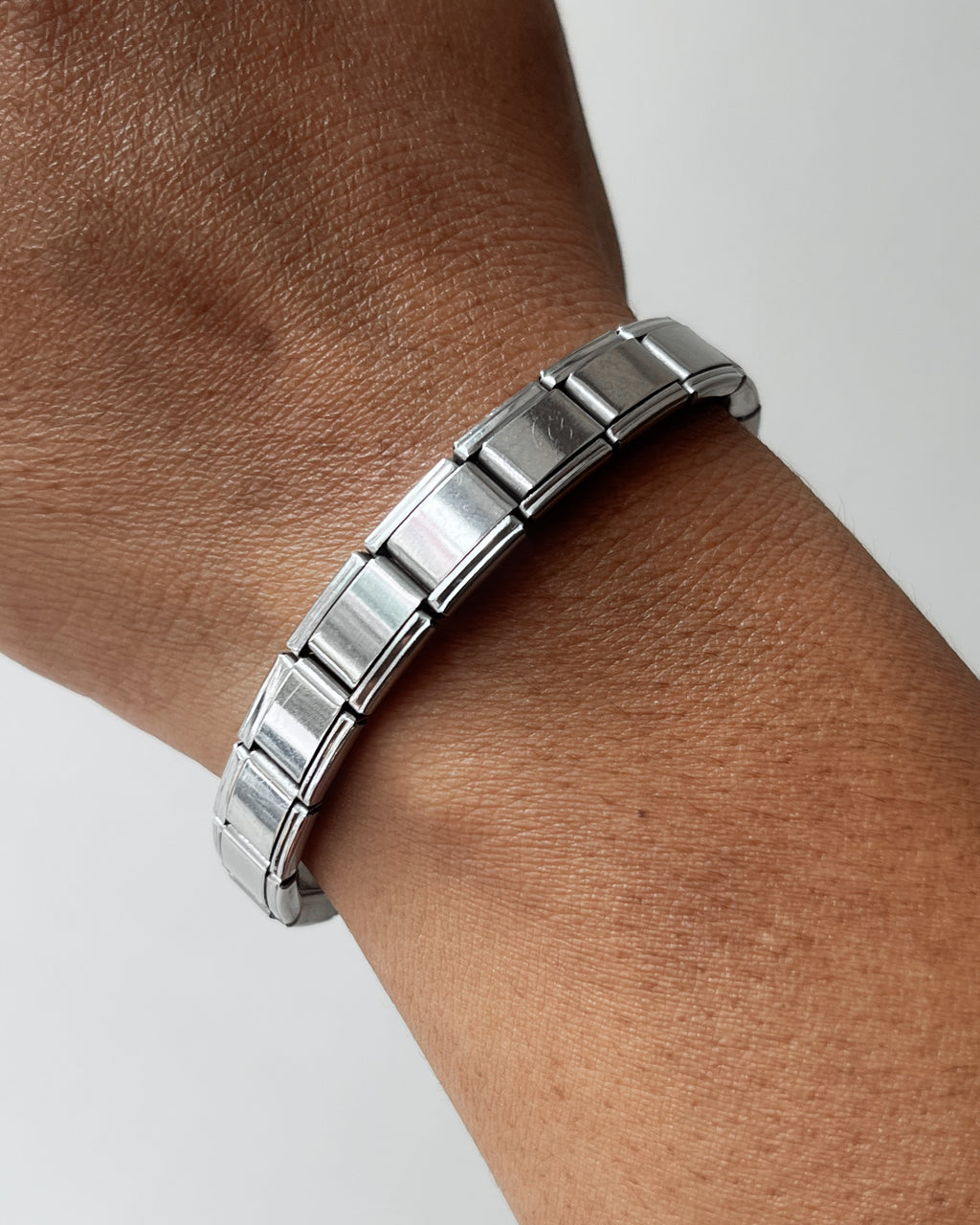 Simple Italian charm bracelet (sasta quality but does the job) yeah it’s stainless steel