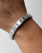 Simple Italian charm bracelet (sasta quality but does the job) yeah it’s stainless steel