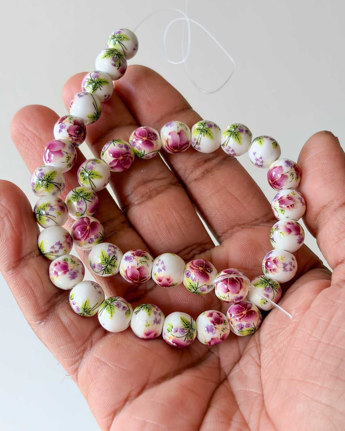 5.0 round ceramic flower beads - 1 line