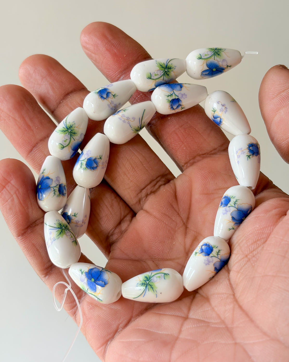 1.0 drop shape ceramic flower beads - 1 line