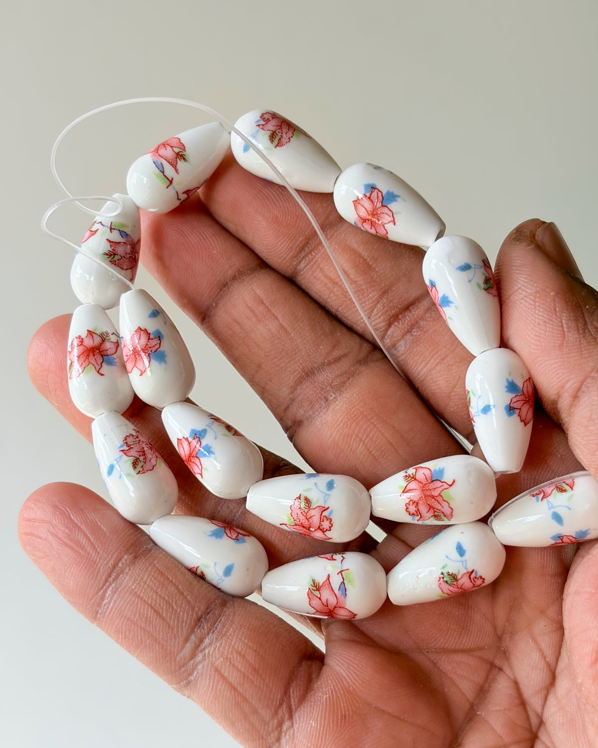 11.0 drop shape ceramic flower beads - 1 line